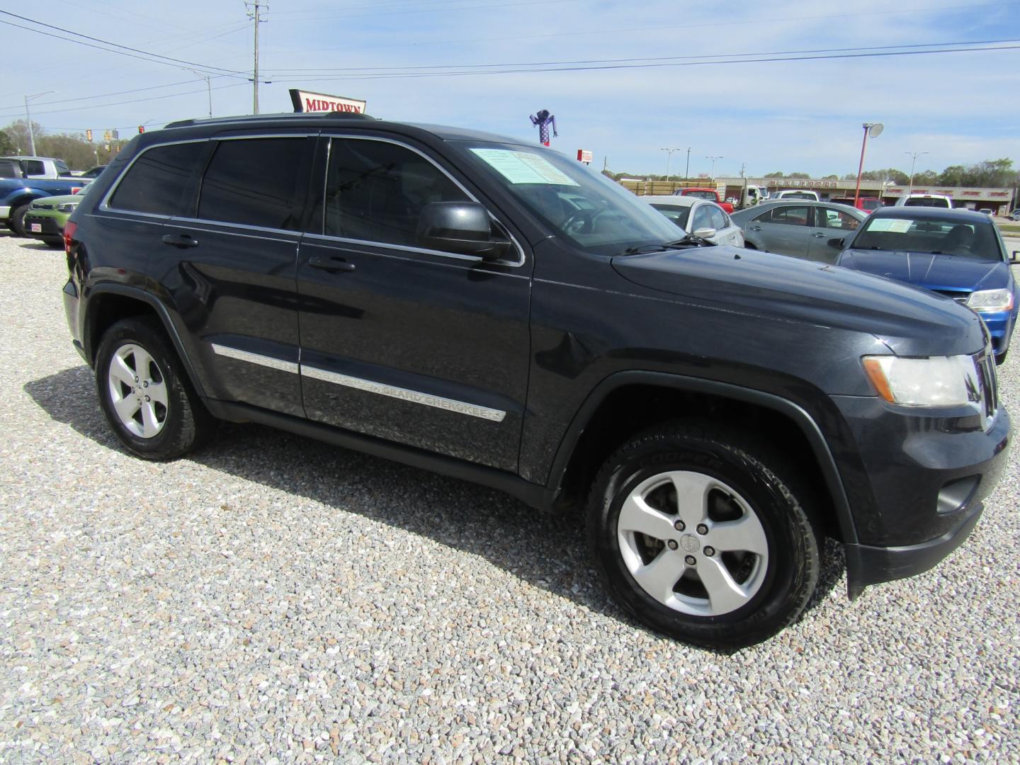 2013 Blue /Gray Jeep Grand Cherokee Laredo 2WD (1C4RJEAG0DC) with an 3.6L V6 DOHC 24V engine, Automatic transmission, located at 15016 S Hwy 231, Midland City, AL, 36350, (334) 983-3001, 31.306210, -85.495277 - Photo#0